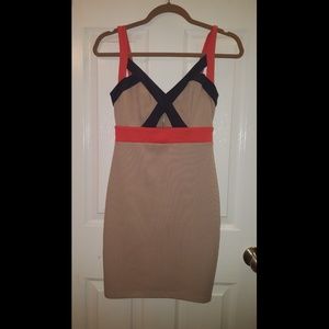 Tan/beige mini dress with black and orange details
